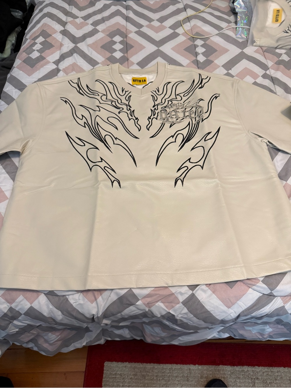 GFTDLA Bone Klive T Shirt Graphic with Black Tribal Design